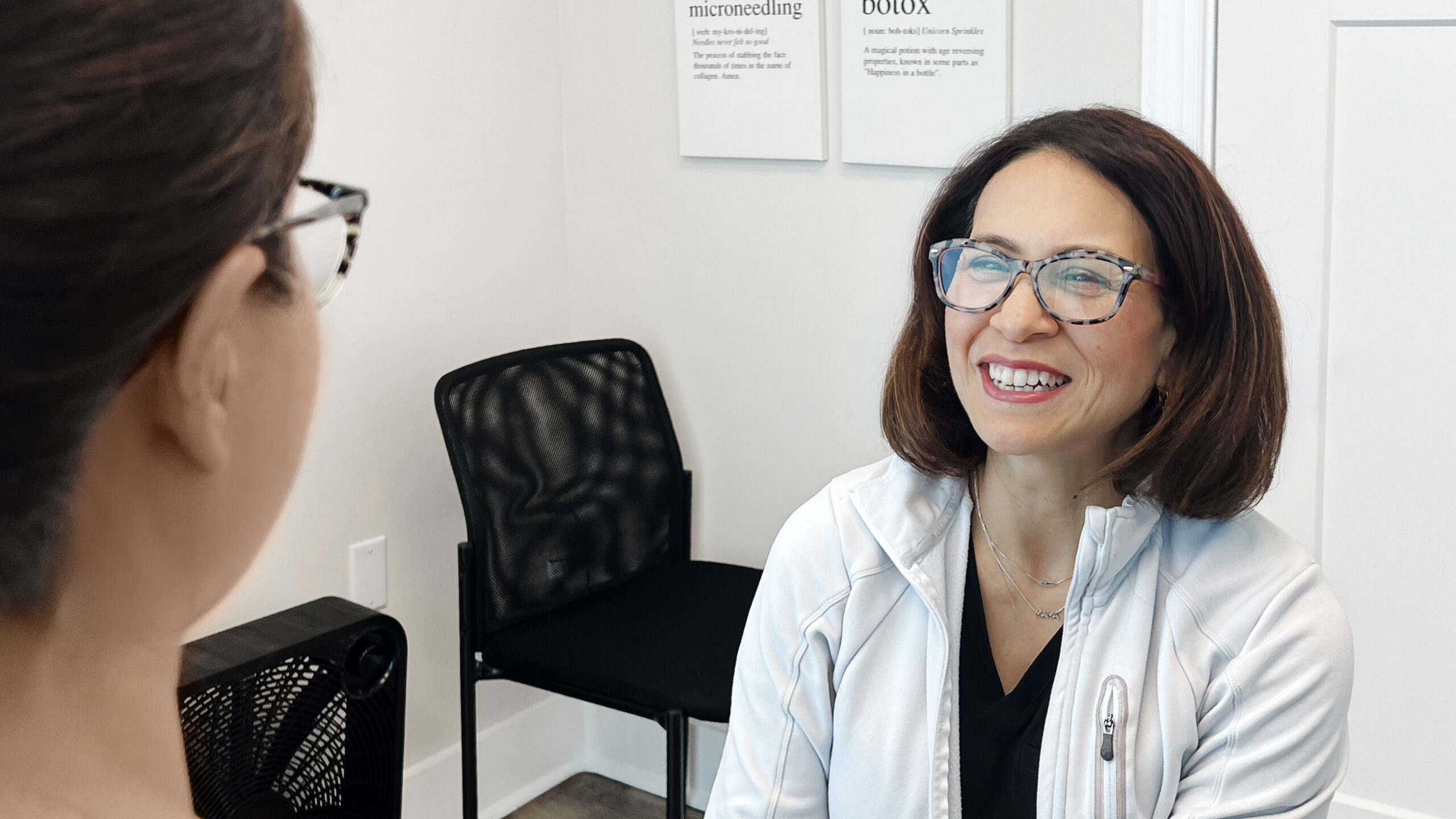 Johanna Molina, CRNP, treating a patient at Urbana Dermatology